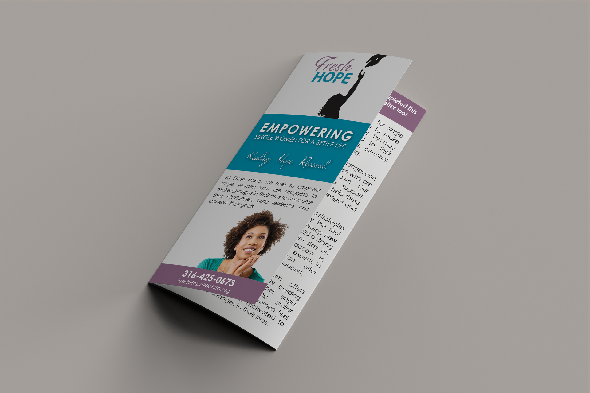 A brochure with a woman on it is sitting on a table.