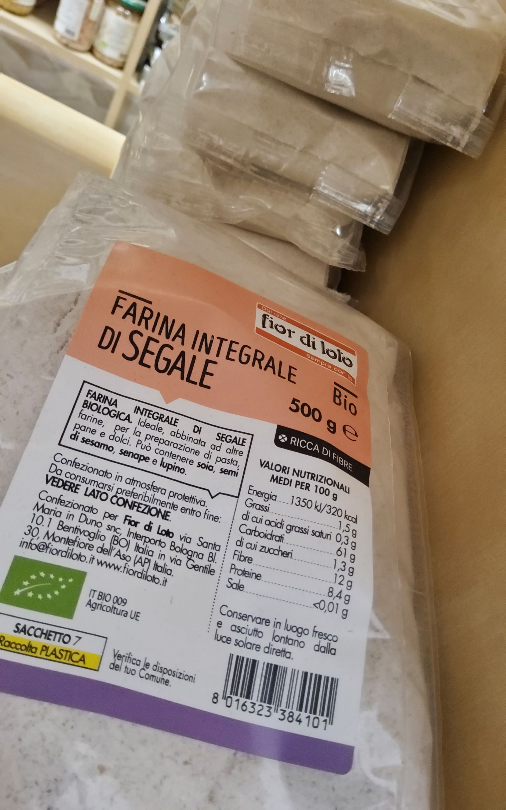 A bag of farina integrale di segale is sitting on a table.