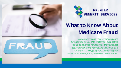 A person is holding a magnifying glass over a piece of paper.