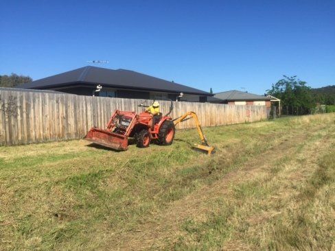 Difficult slope and drain slashing using a reach or slope mower