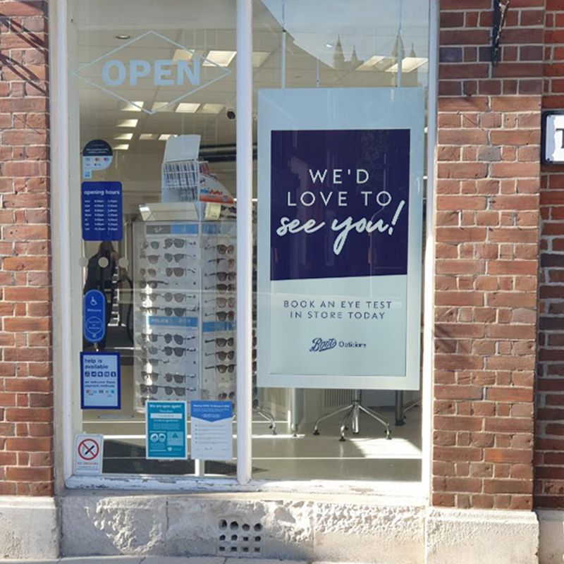 A store front with a sign that says we 'd love to see you