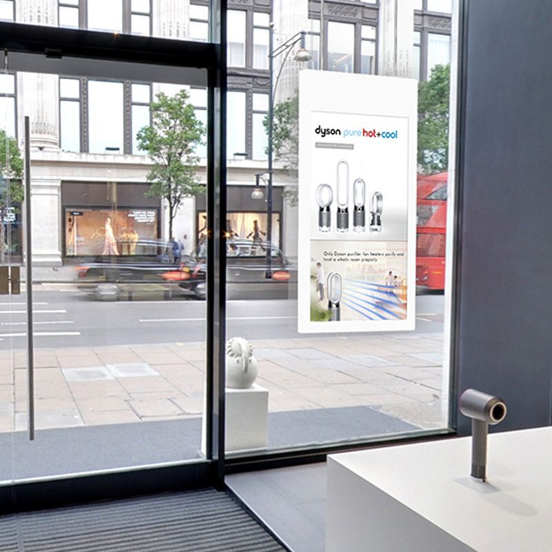 A window with a sign that says dyson on it