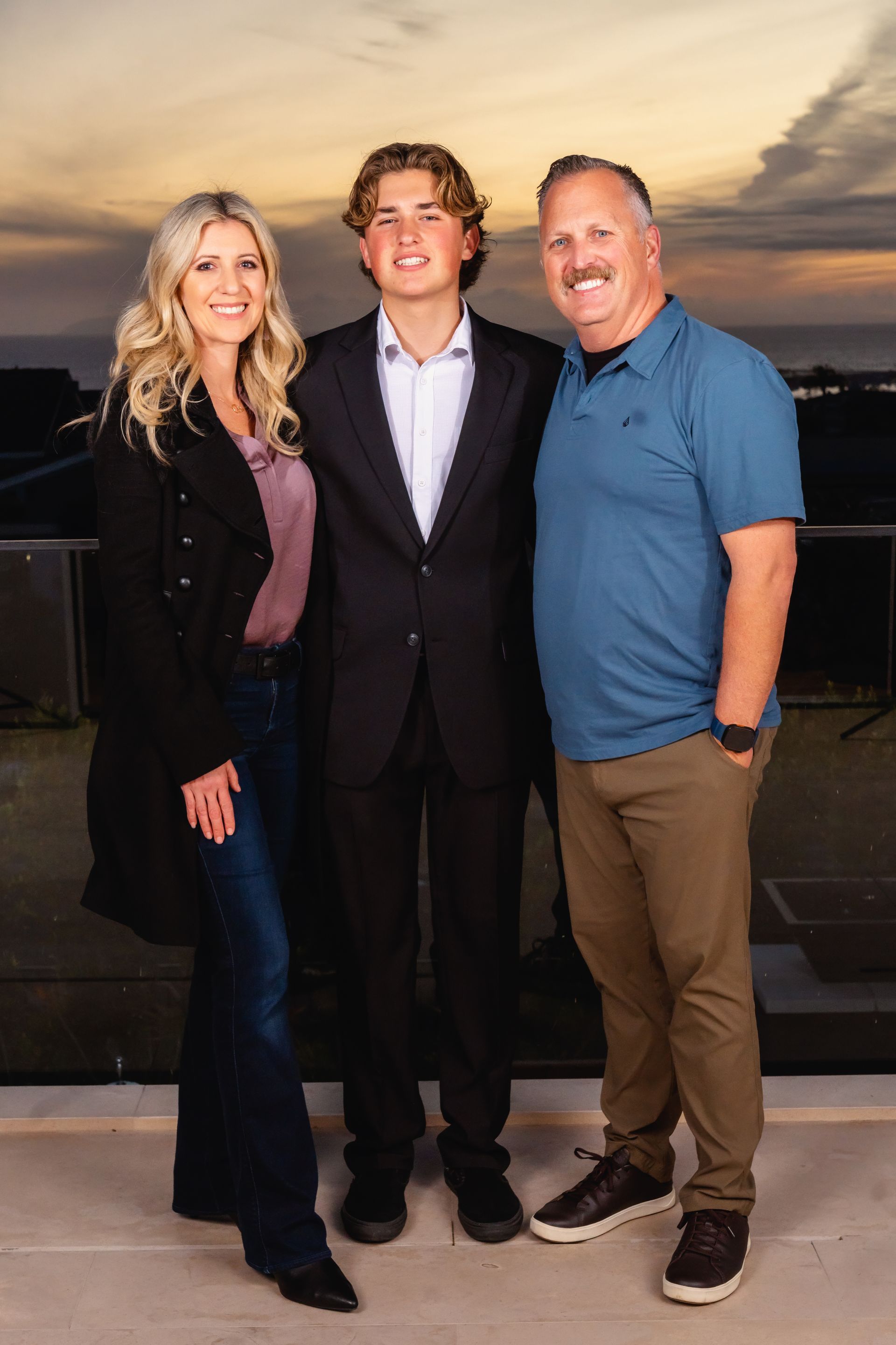 A photo of a parent and their son.