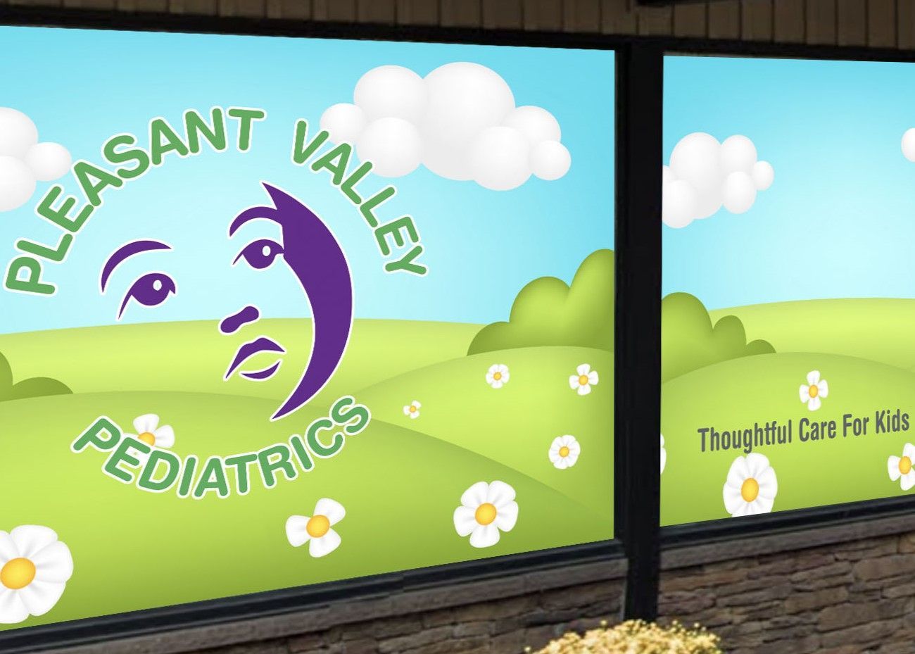 Outside window of Pleasant Valley Pediatrics with the pediatric logo on it. 