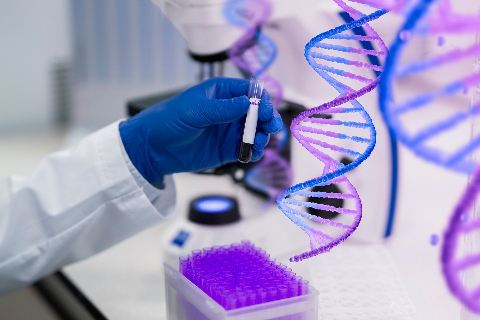 a scientist is holding a pipette in front of a model of dna