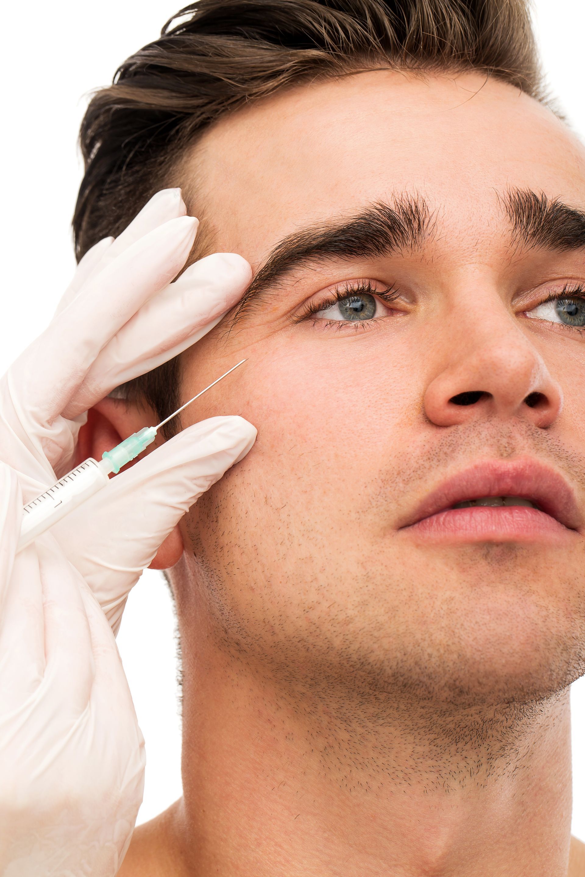 a man is getting a botox injection in his face