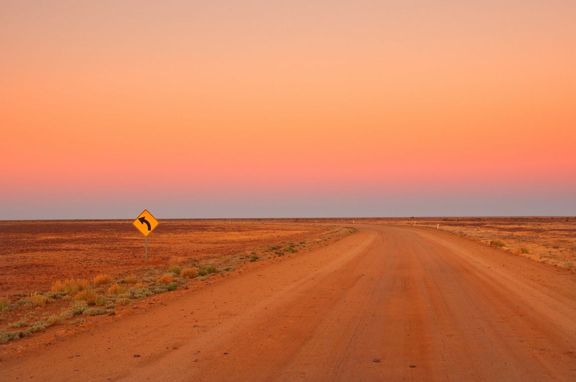 outback dirt road sunset Coober Pedy