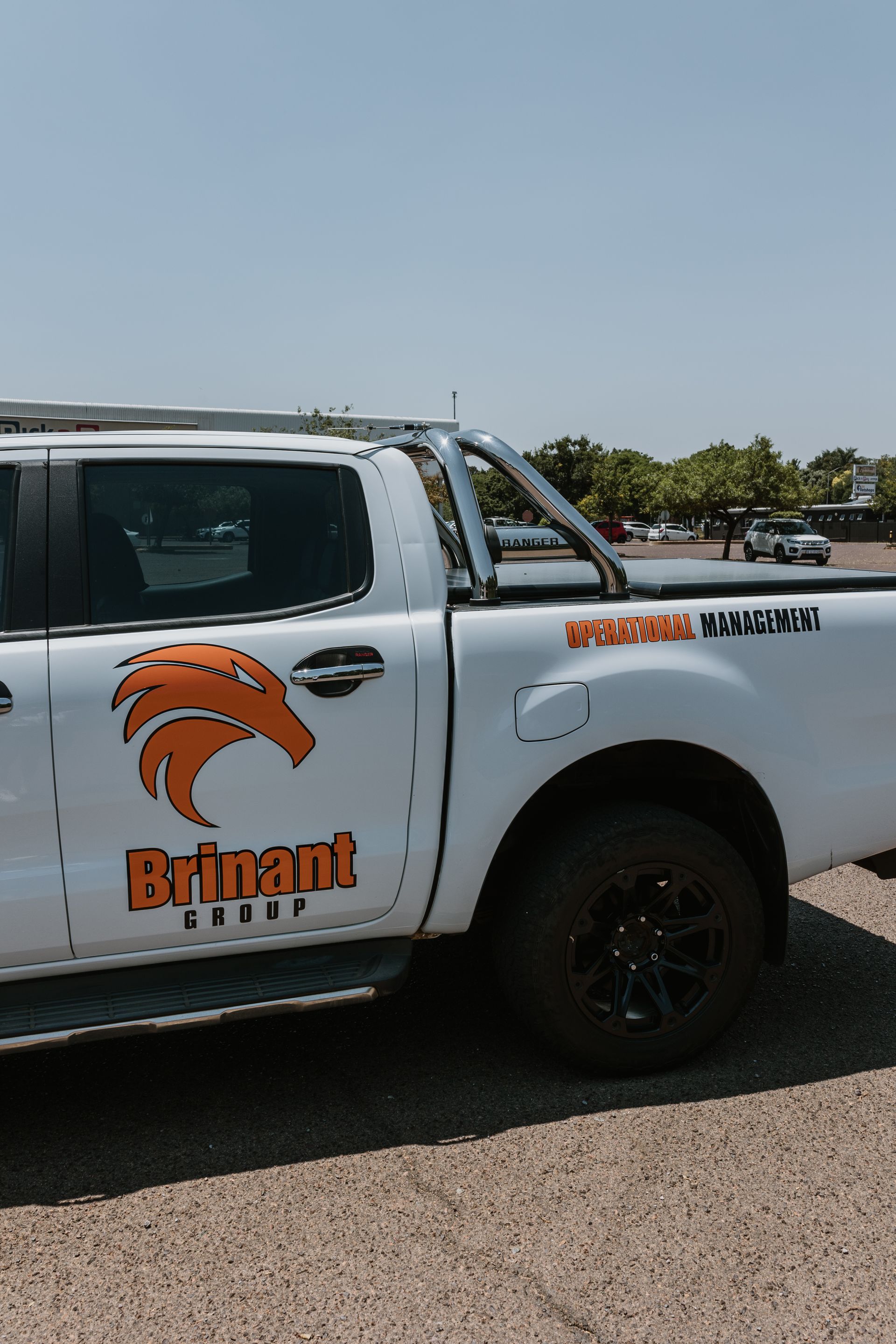 Brinant Group New orange Logo