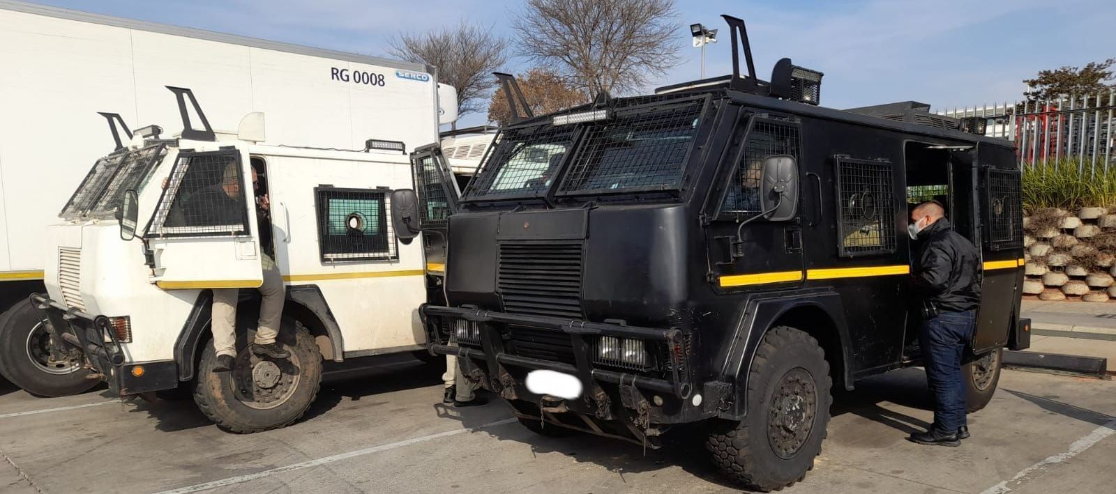 2 Armored Vehicles - 1 black and 1 white.