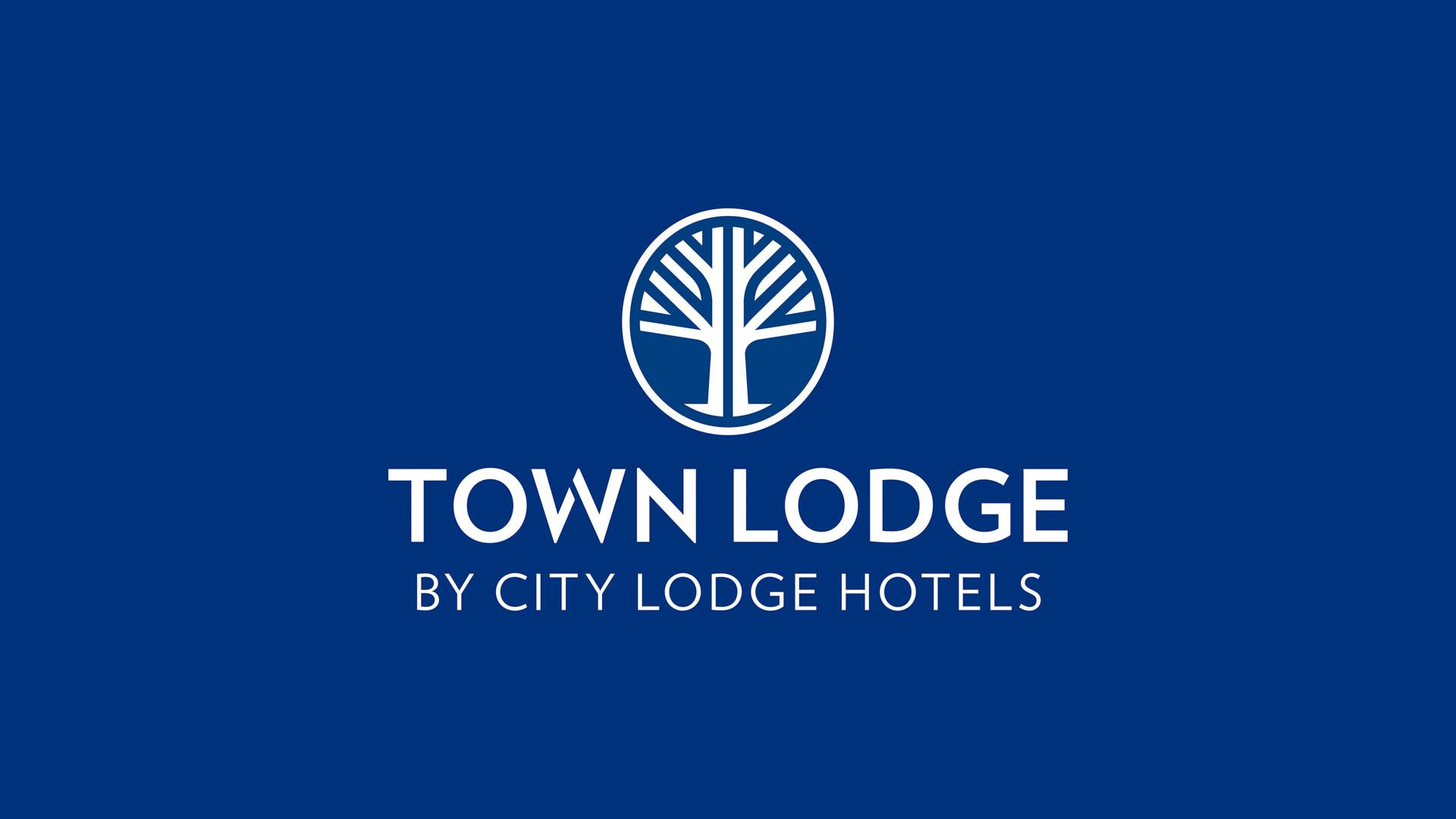 Town Lodge by City Lodge Hotels blue logo.