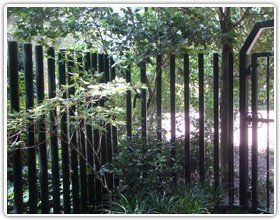 Backyard Wooden Fence | Katy, TX | American Mobile Welding