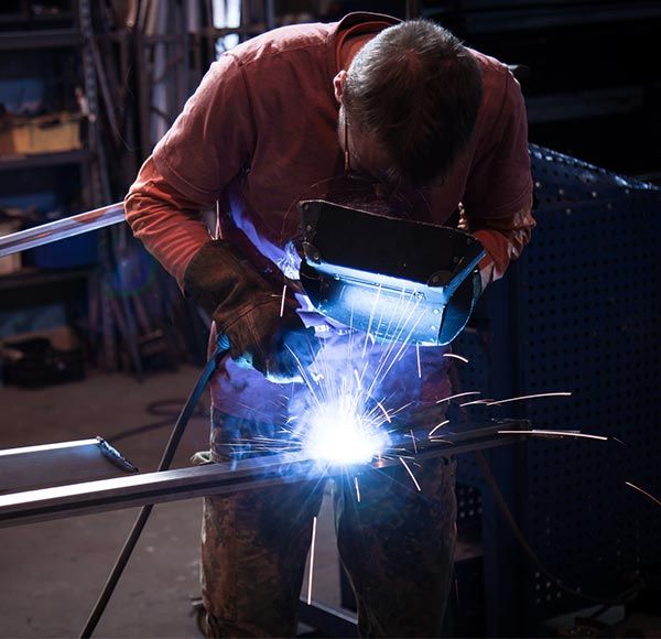 Welder Working on a Custom Welded Steel | Katy, TX | American Mobile Welding