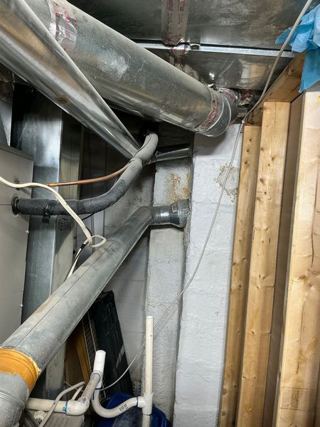 Shower head spraying water.