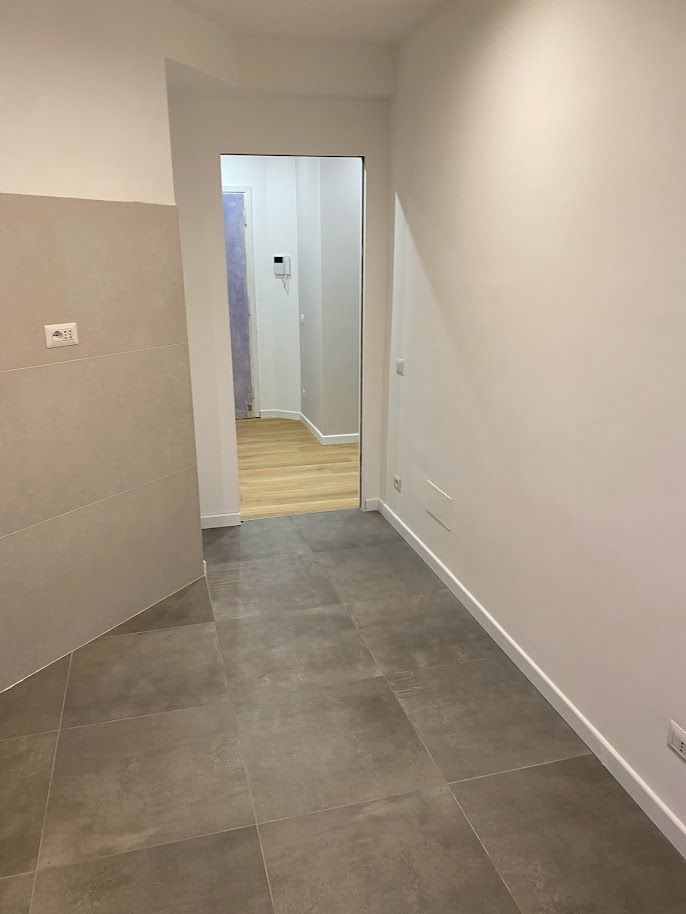 Cucina separata ristrutturazione appartamento Roma Marconi