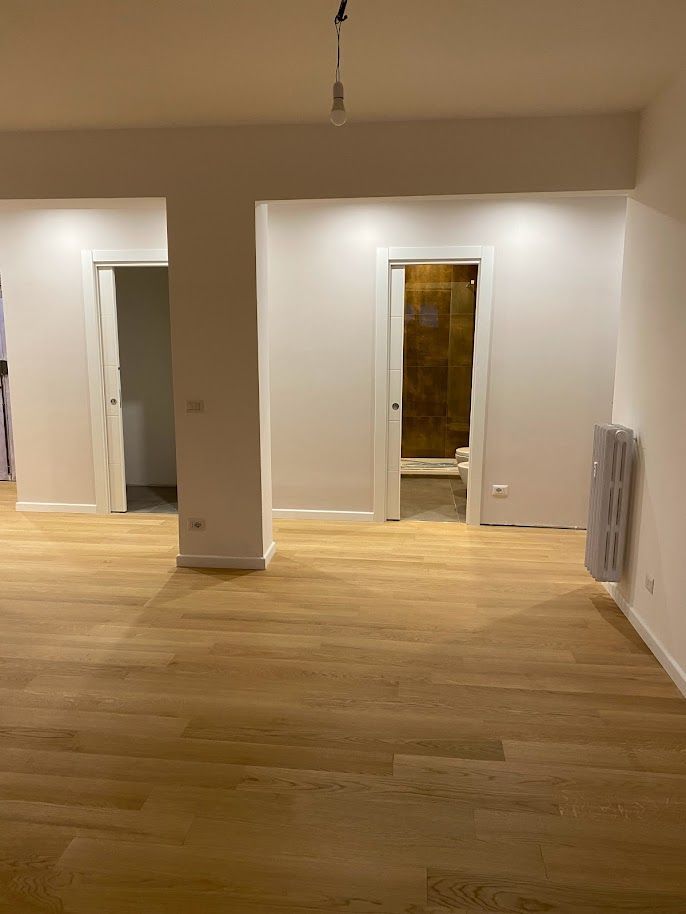 Nuovo soggiorno ampio ristrutturazione casa Roma Marconi