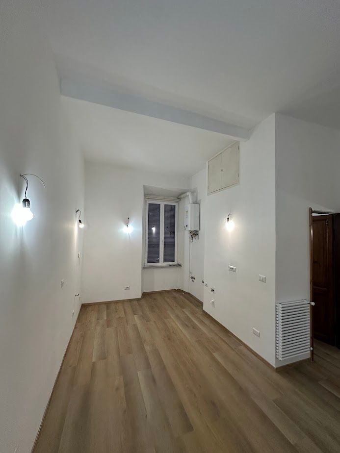 Restyling appartamento storico a Roma – soffitto a volte e finiture moderne
