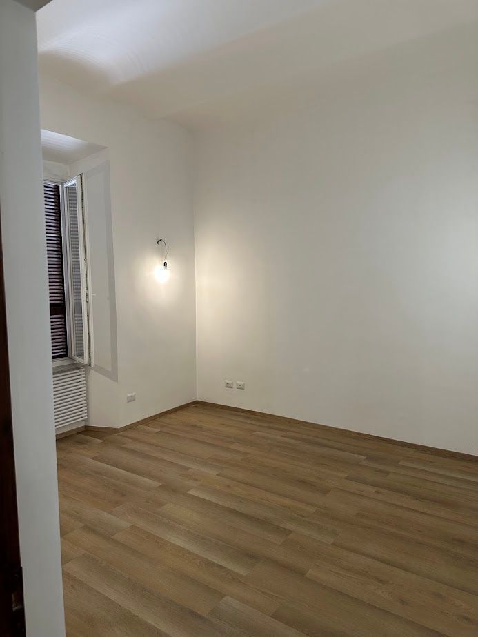 Pavimento SPC effetto legno in appartamento zona Colosseo Roma