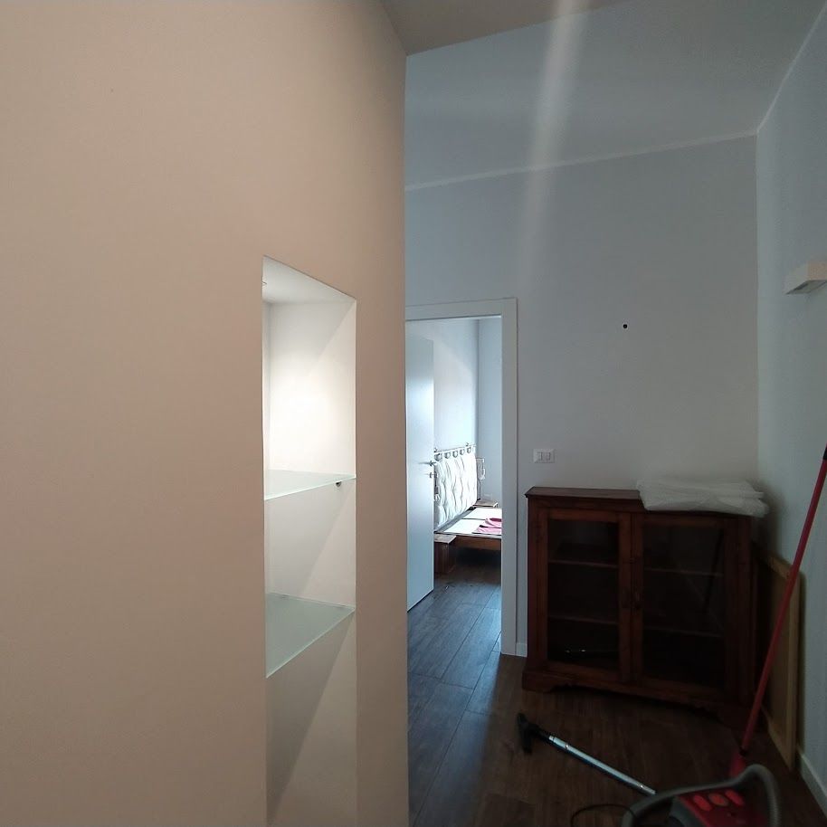 Zona living moderna ristrutturazione casa Roma