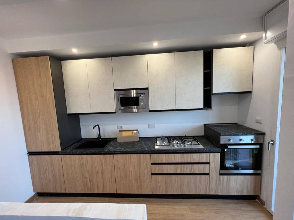 Open space ristrutturato a Roma Monteverde con controsoffitti moderni