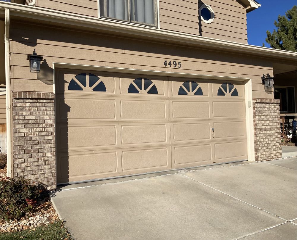 A tan garage door