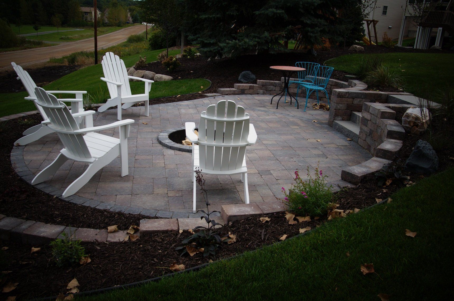 Around the fire pit - landscaping in Delano, MN