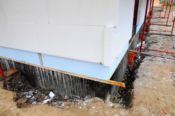 a foundation wall dug out on the outside