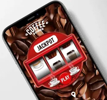 A phone displays a slot machine game called Coffee Power