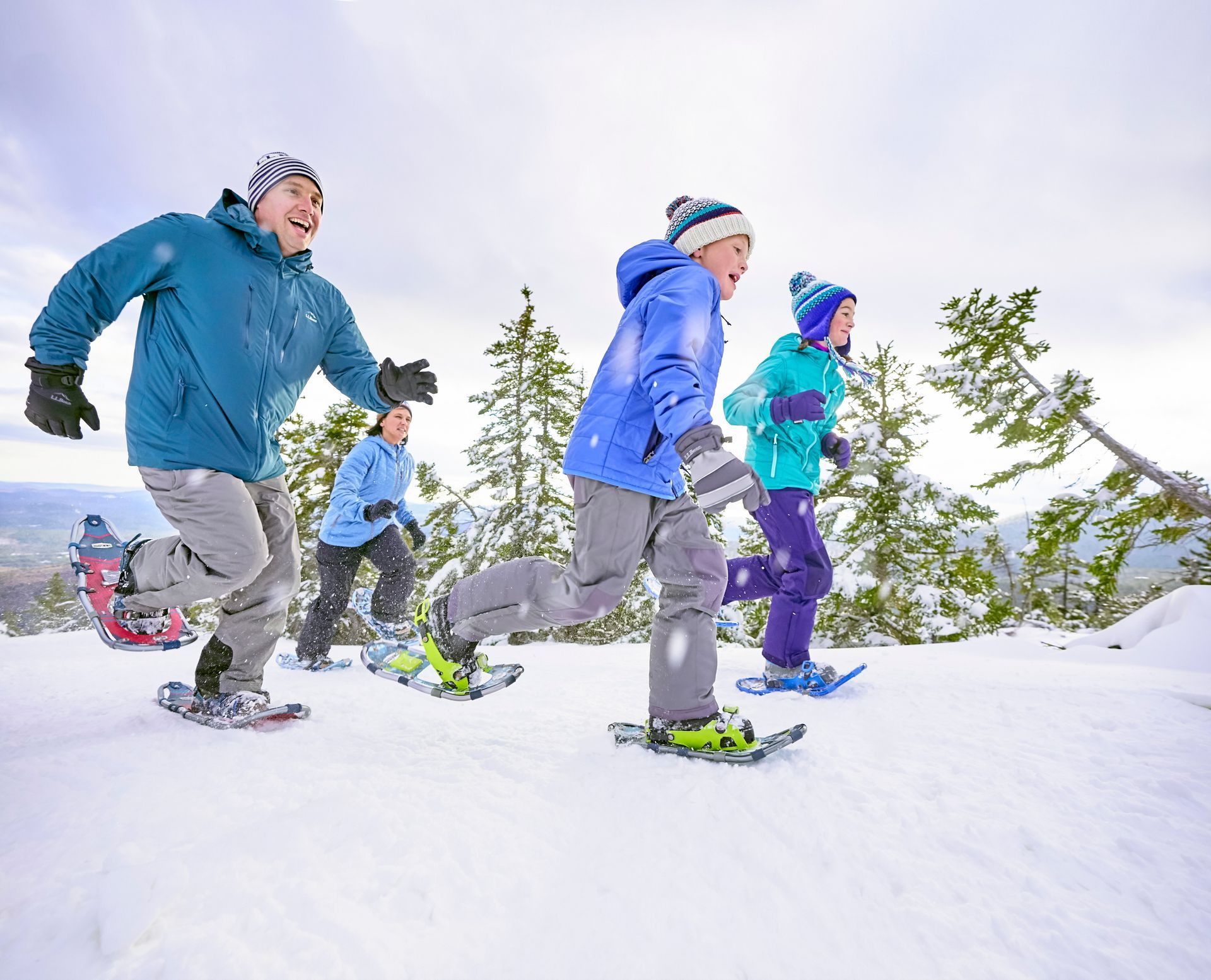 A family snowshoeing together.