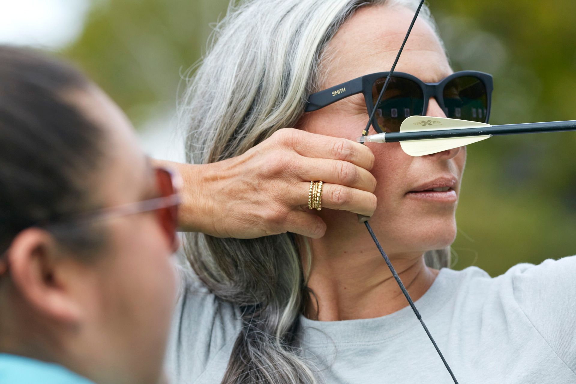 close-up image showing archery anchor point against cheek