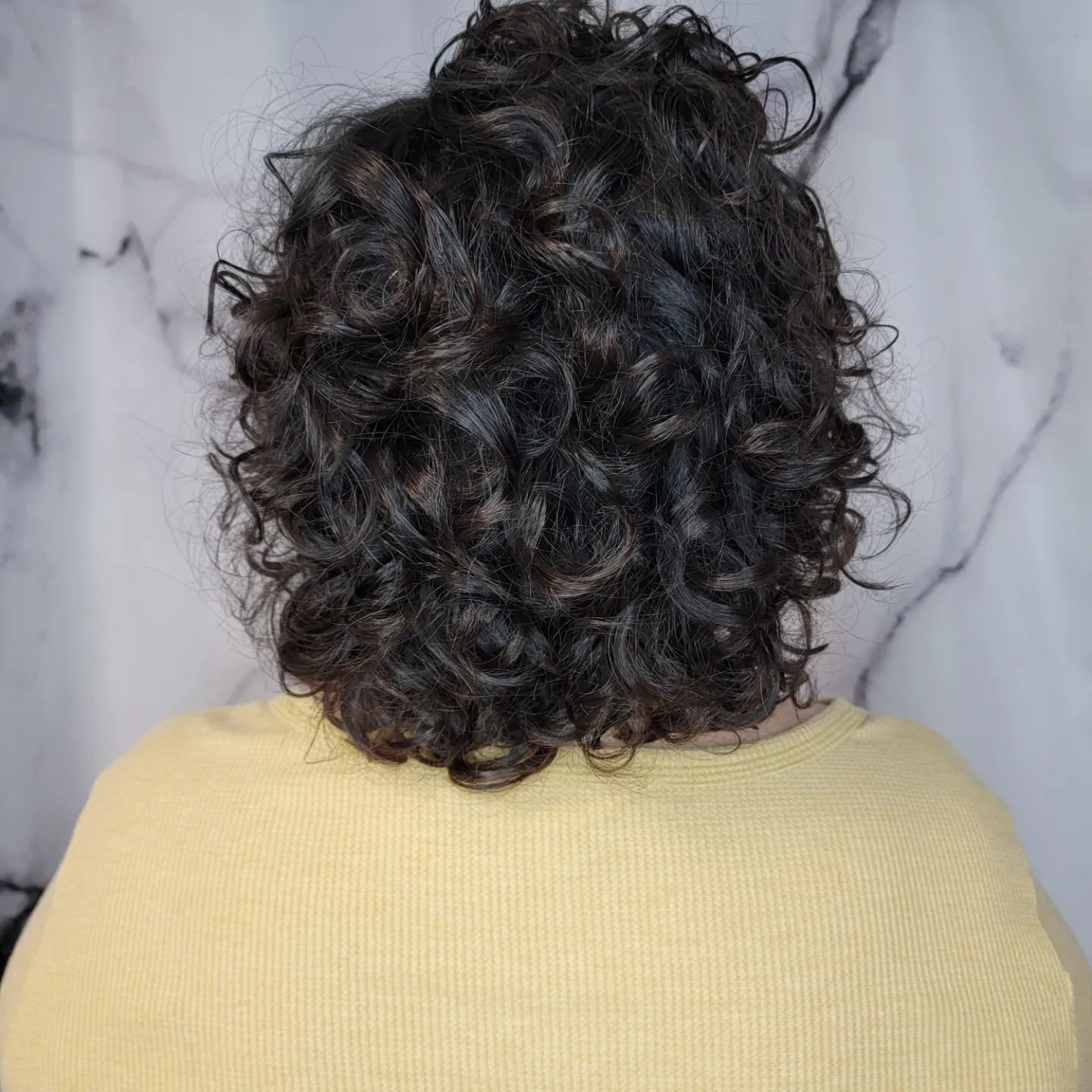 Curly black hair — Brandon, FL — Hairstyling By Tina