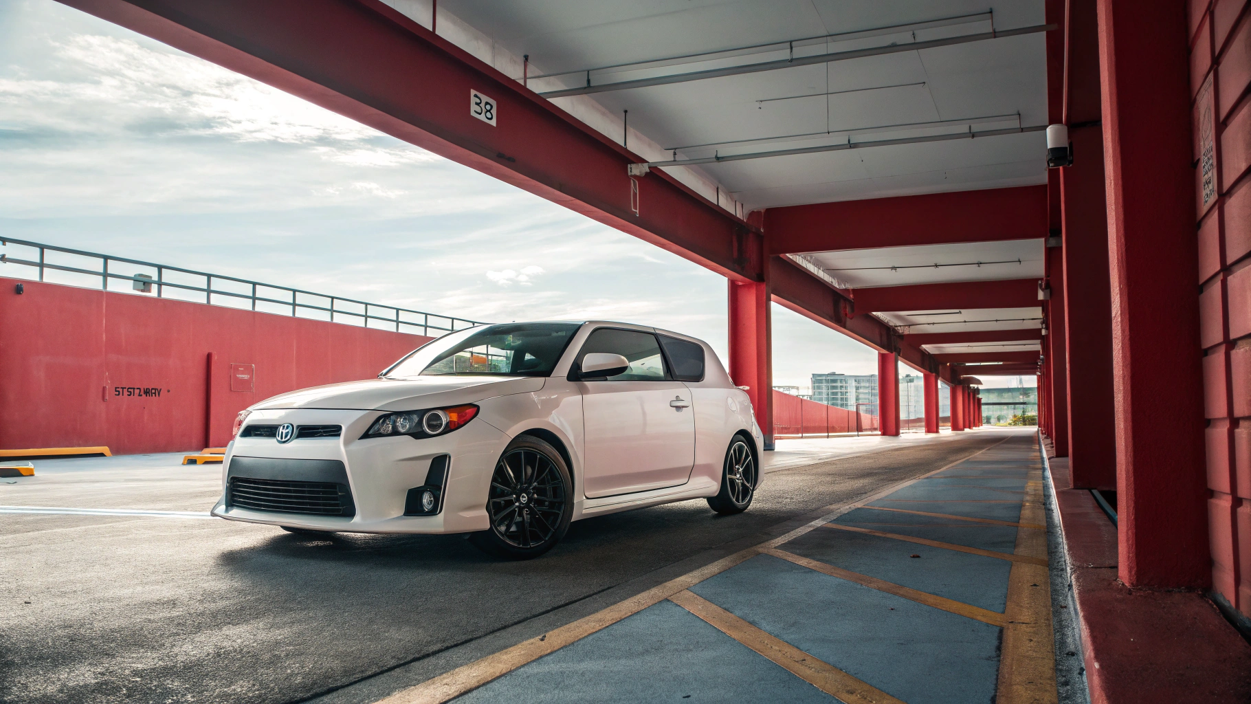 Mid-century modern credenza with a lamp and decorative objects, in a sunlit room.