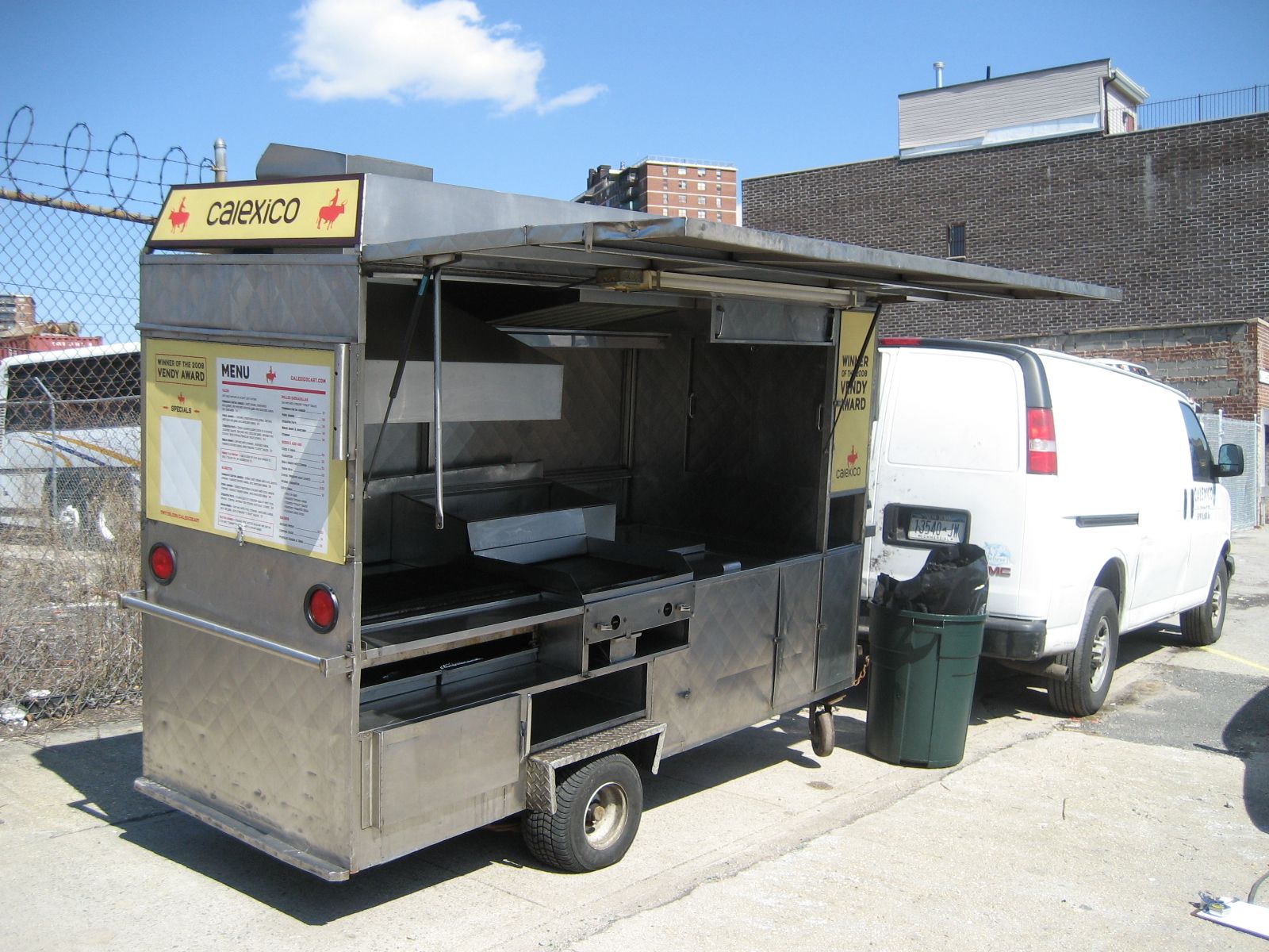 A food truck with the word chipotle on it