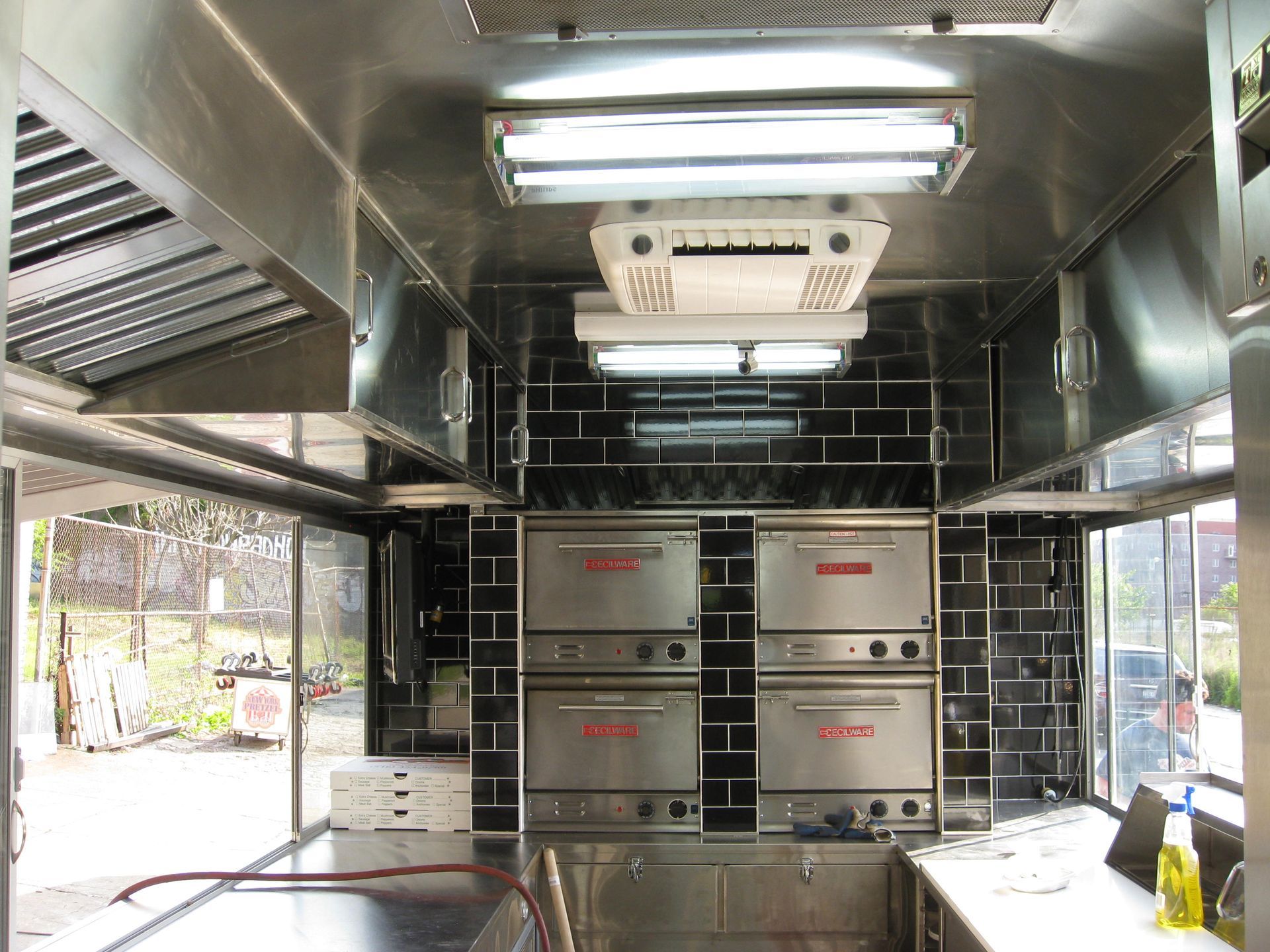 A kitchen with a lot of stainless steel appliances