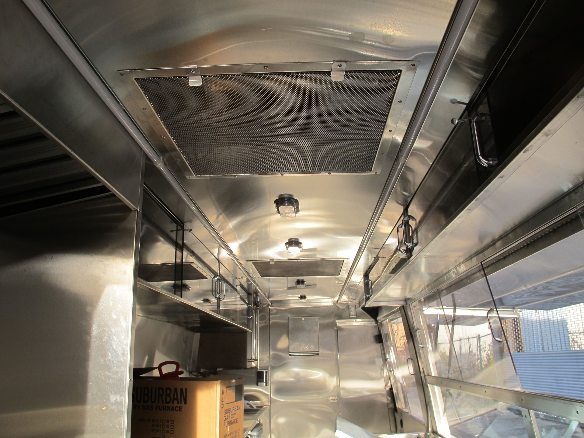 A kitchen with a lot of stainless steel appliances