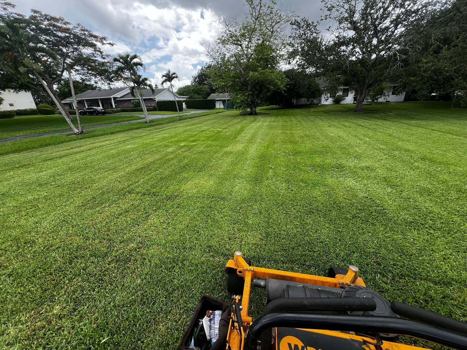  cutting a lush green lawn