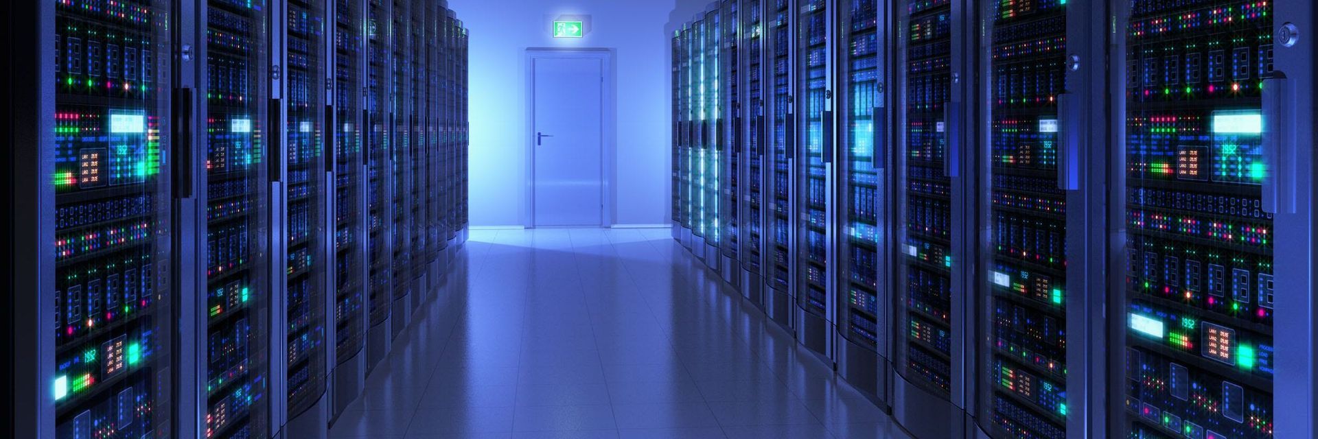 A hallway filled with rows of servers in a data center.