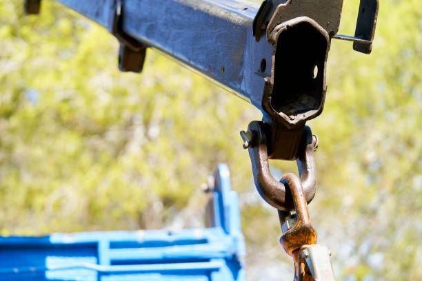 A close up of a metal object with a chain attached to it.