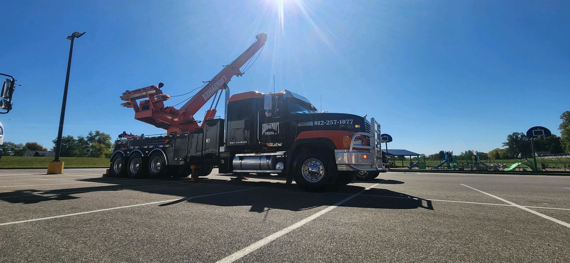 A trailer is being towed by a truck.