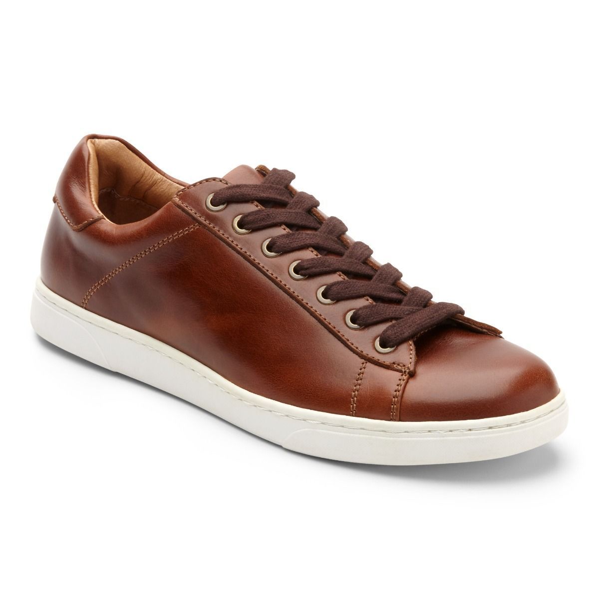 A Pair of Brown Leather Sneakers with White Soles — Swan Podiatry and Orthotics in Katherine, NT