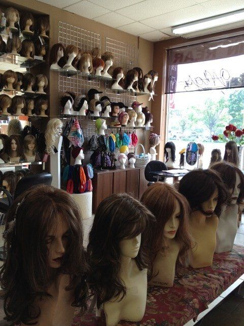 Long Hair Wigs on the Counter — Westbury, NY — Wig Wam Hair
