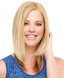 Woman Holding her Medium Hair — Westbury, NY — Wig Wam Hair