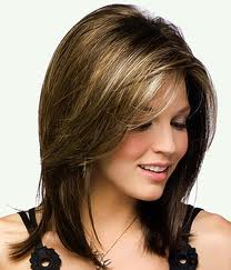 Smirking Woman with her Medium Hair — Westbury, NY — Wig Wam Hair