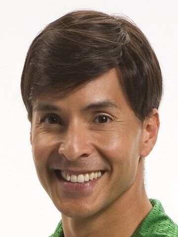 Man Smiling at Camera — Westbury, NY — Wig Wam Hair