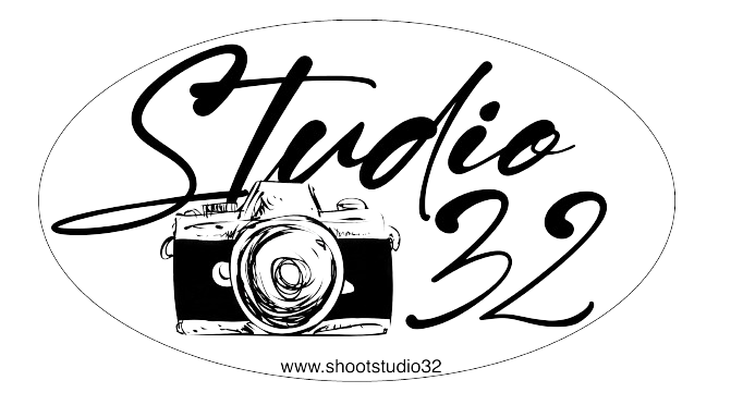 A black and white logo for studio 32 with a camera on it.