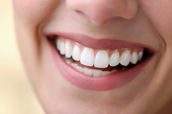 Woman Smiling | Dental Implants | Natural Dentist in Morgantown WV