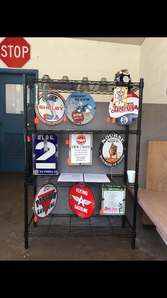 A shelf with a stop sign on top of it