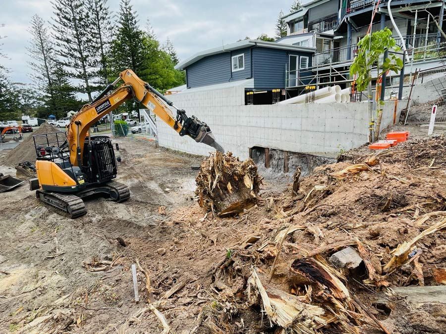 A Large Building Is Being Demolished by A Bulldozer — Lifestyle Demolition In Brunswick Heads, NSW