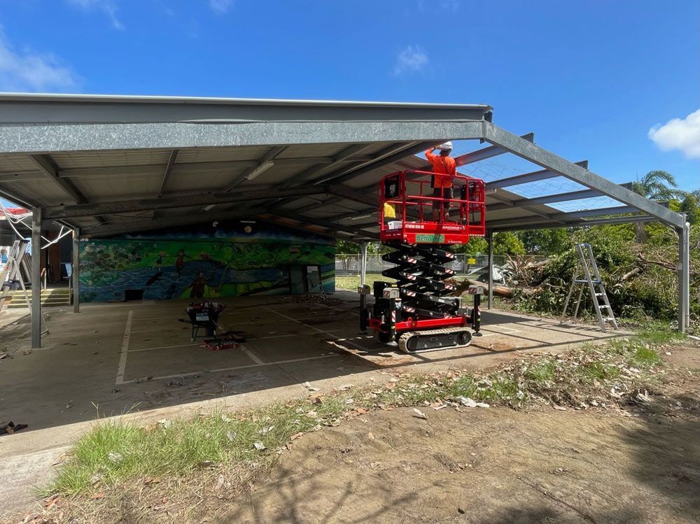 A Dump Truck Is Dumping Dirt Into a Pile of Rocks — Lifestyle Demolition In Murwillumbah, NSW
