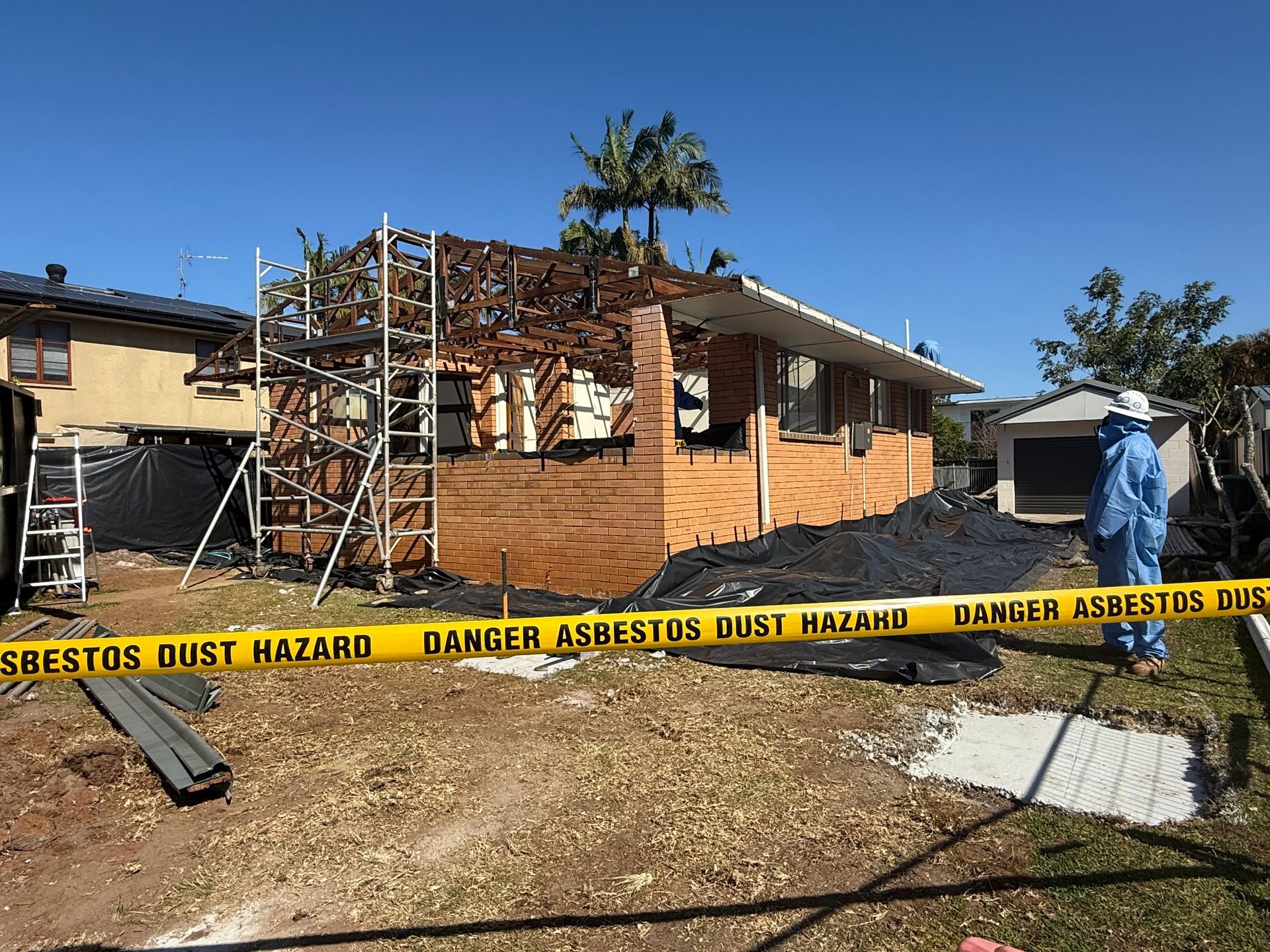 Damaged House Under Repair with Caution Tape — Lifestyle Demolition In Brunswick Heads, NSW