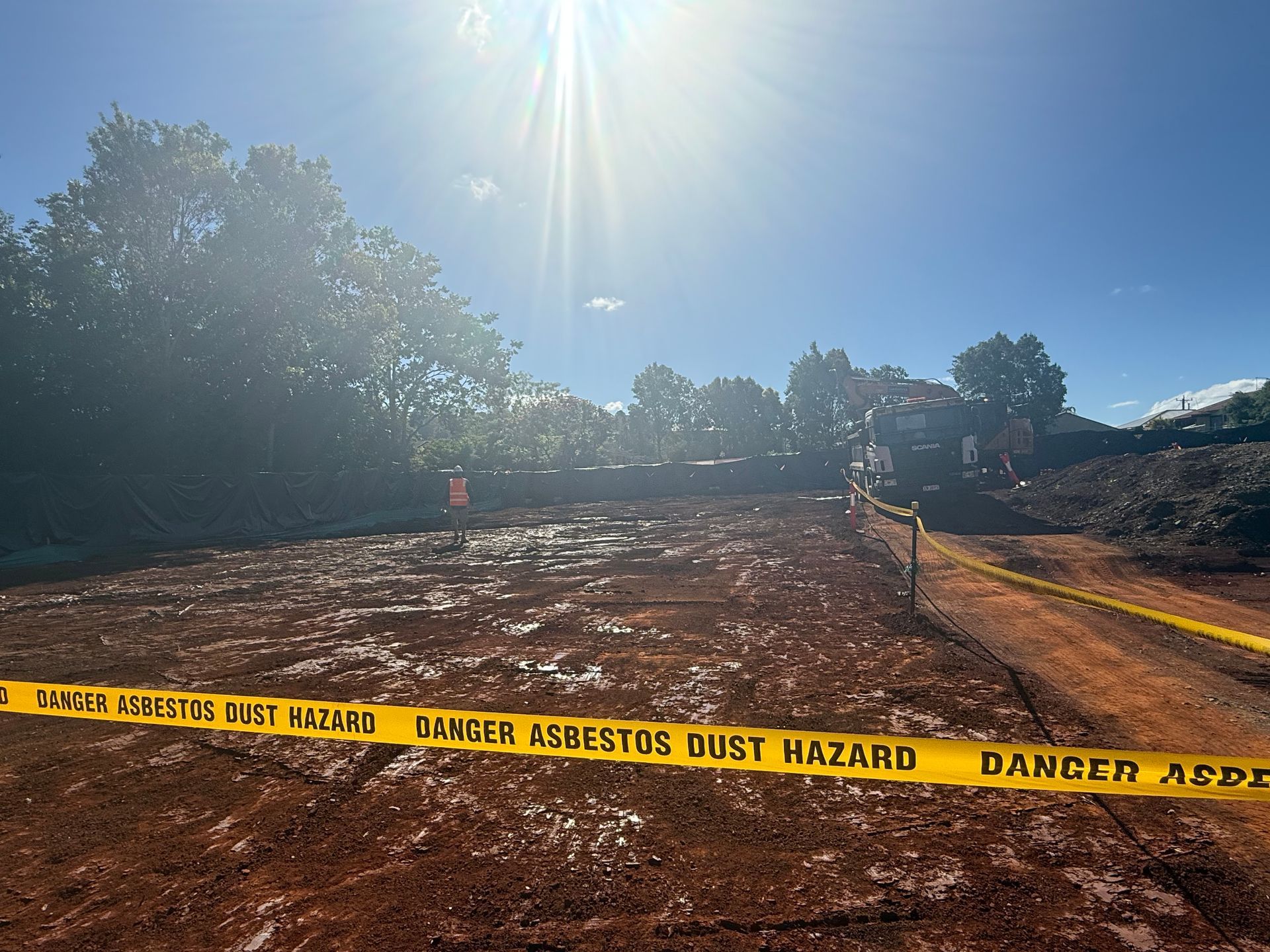 Construction Site Marked with Yellow Asbestos Hazard Tape — Lifestyle Demolition In Brunswick Heads, NSW